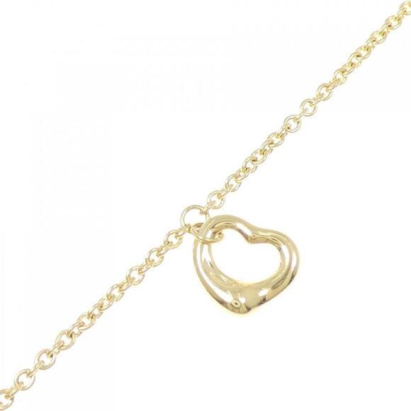 Tiffany & Co. Jewelry - TIFFANY Gold Heart Charm Bracelet